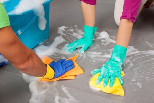 Cleaner working on residential and commercial glass in Kennington