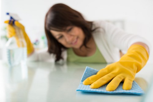 Upholstery treatment for a well-used sofa with visible wear