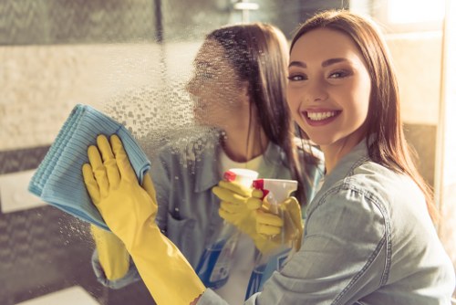 Local cleaner preparing a short-let kitchen in Kennington